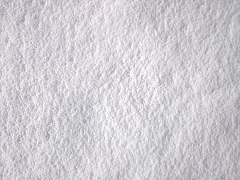Close-up texture of fresh white snow surface