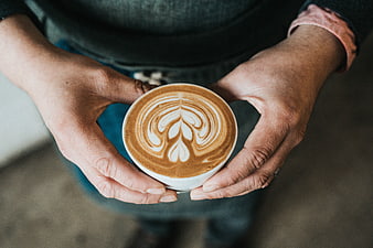Barista Hands Holding Latte Art Coffee Cup