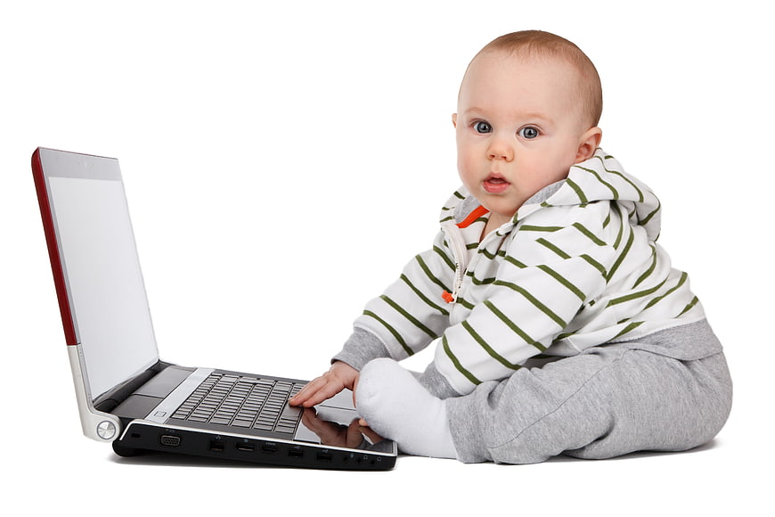 Baby Sitting with Laptop on White Background