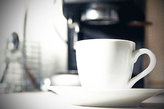 White Coffee Cup and Saucer on Kitchen Counter