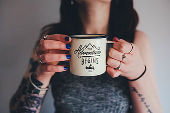 Woman Holding Adventure Begins Coffee Mug