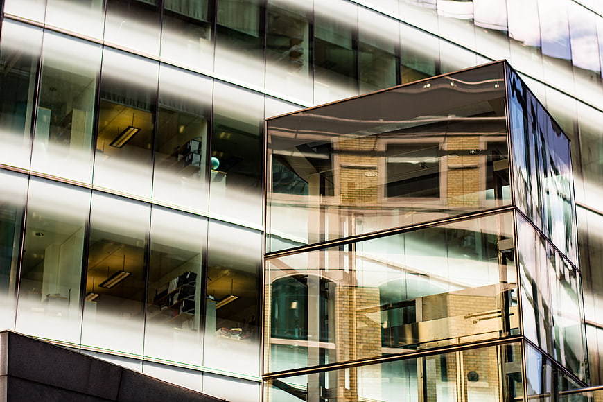 Modern Glass Office Building with Reflections