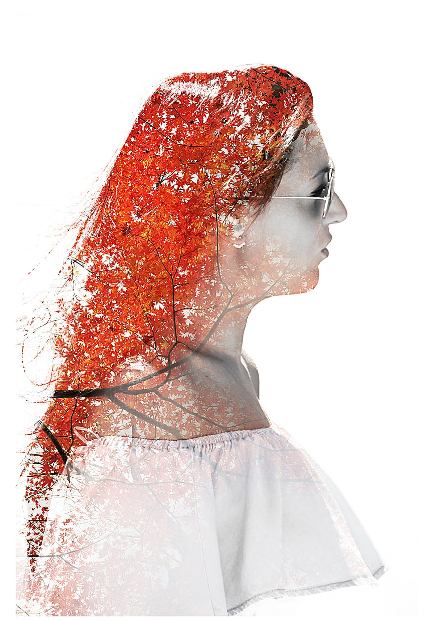 Artistic Double Exposure Woman with Red Autumn Leaves