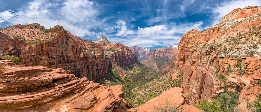 Panoramic View of Red Rock Canyon Landscape with Blue Sky
