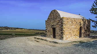 Ancient stone Orthodox church in Cyprus landscape