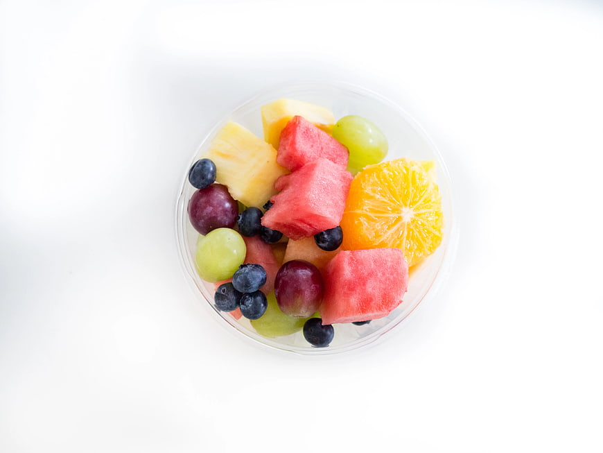 Top View of Fresh Fruit Salad in Clear Plastic Cup