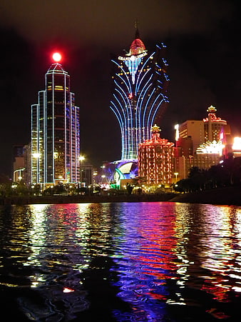 Macau Night Skyline With Grand Lisboa Casino And Water Reflections