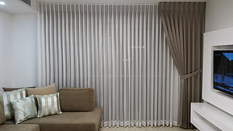 Modern Living Room Interior With Gray Vertical Blinds And Brown Sofa