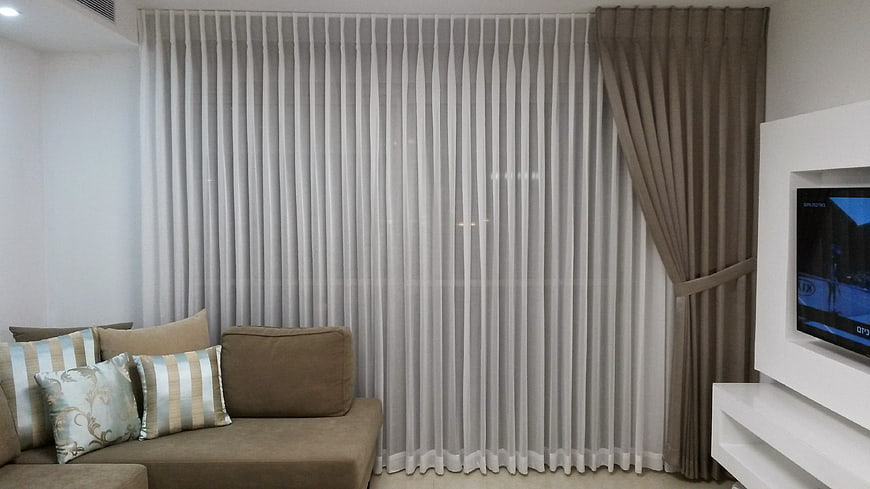 Modern Living Room Interior With Gray Vertical Blinds And Brown Sofa