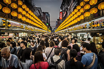 Crowded Keelung Night Market with Yellow Lanterns