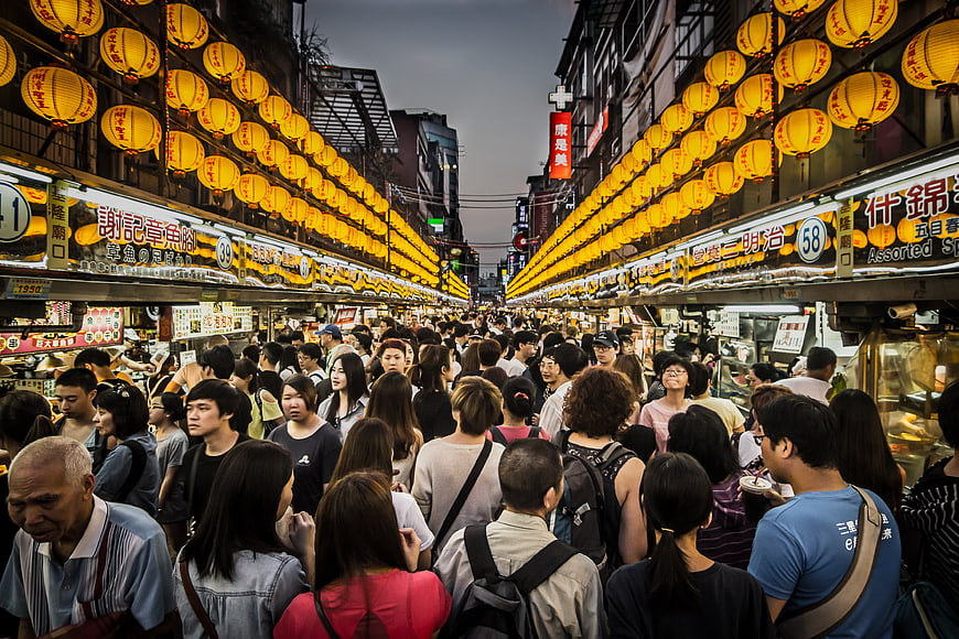 Crowded Keelung Night Market with Yellow Lanterns