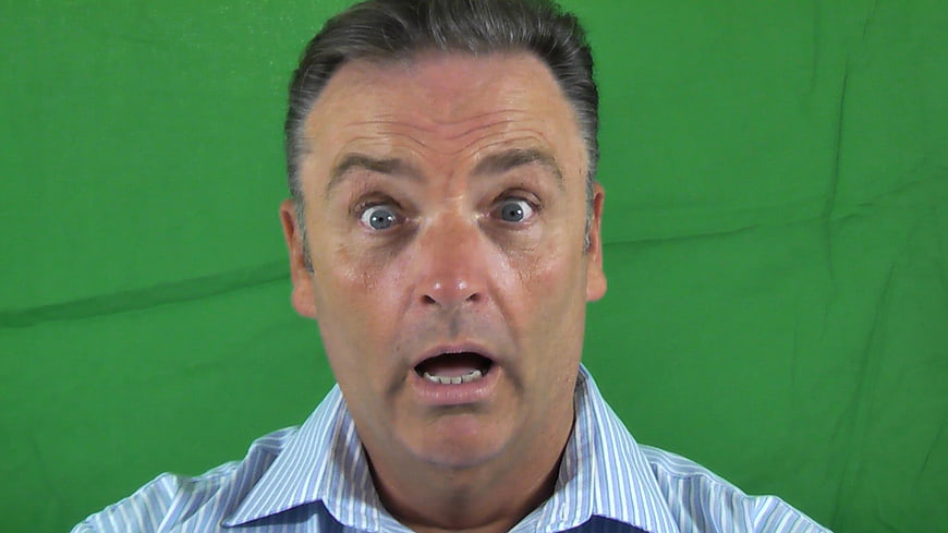 Surprised Middle-Aged Man With Shocked Expression Against Green Screen