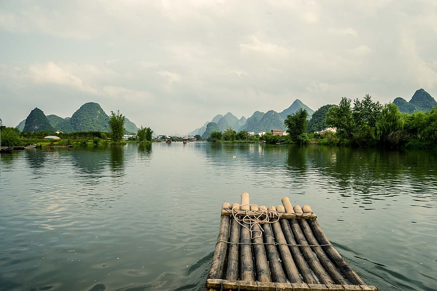 Bamboo raft on Li River with karst mountains in Guilin, China