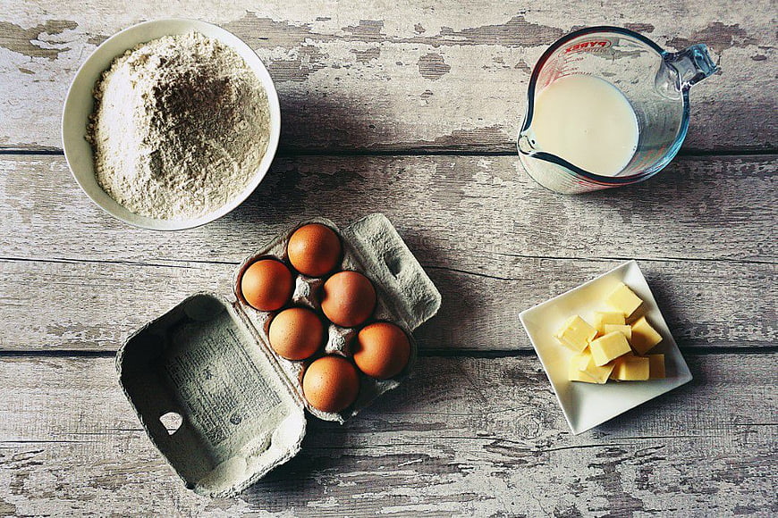 Baking Ingredients Flat Lay on Rustic Wood