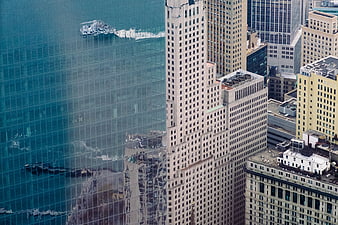 High-angle view of city skyscrapers with glass reflection
