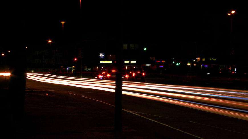 Long Exposure Night Traffic Light Trails on City Street