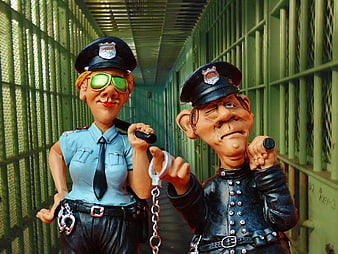 Caricature Police Statues in Green Prison Cell Corridor
