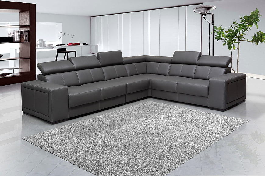 Modern gray leather sectional sofa in minimalist living room