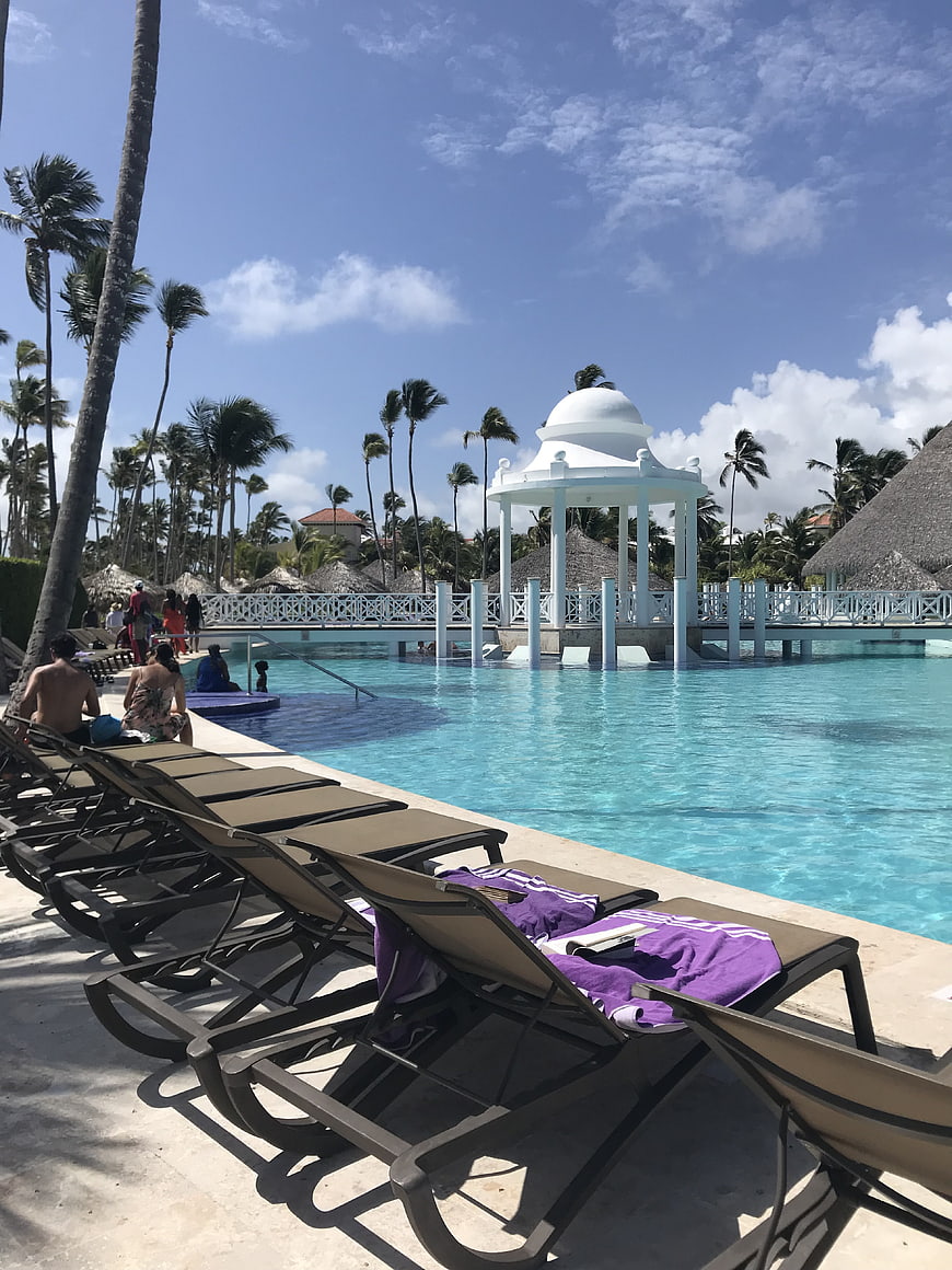 Tropical Resort Poolside with Lounge Chairs and Gazebo