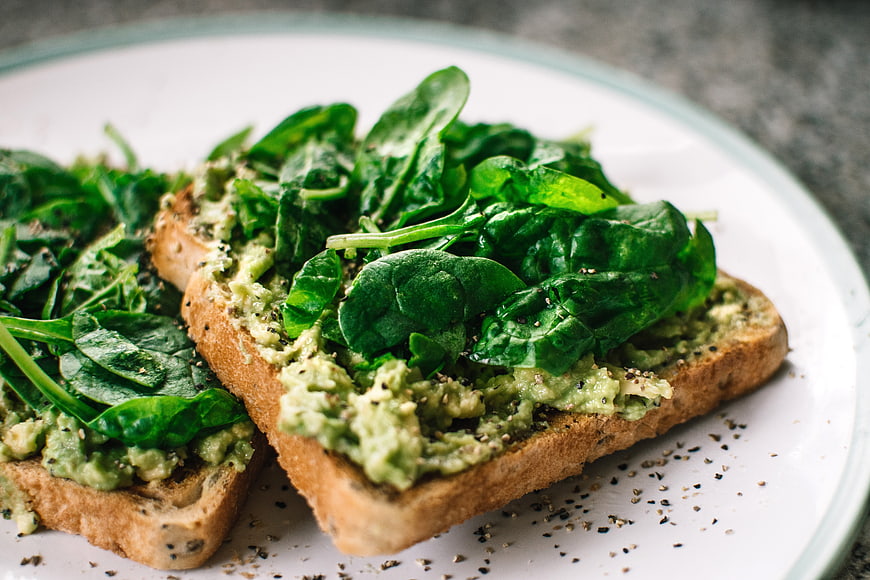 Healthy Avocado Toast with Fresh Spinach Leaves