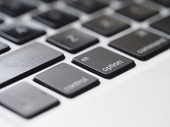 Close-up of MacBook keyboard with option and control keys