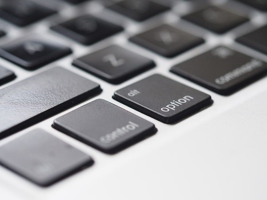 Close-up of MacBook keyboard with option and control keys