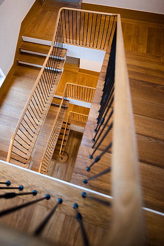 High Angle View of Modern Wooden Spiral Staircase Interior