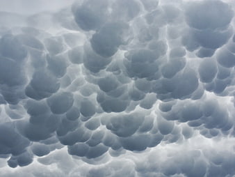 Dramatic Mammatus Clouds Filling Moody Overcast Sky