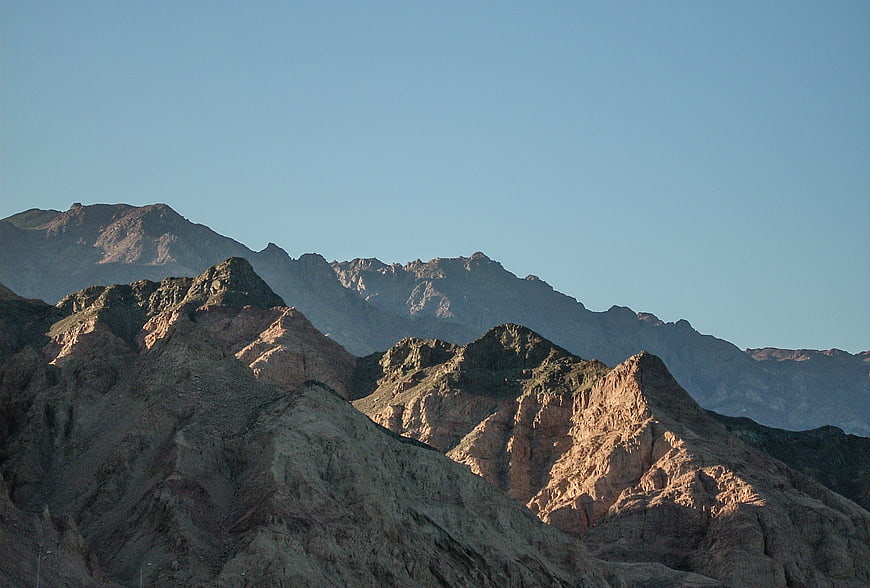 Sunlit Mount Sinai Peaks Against Clear Blue Sky