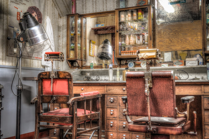 Vintage barbershop interior with retro chairs and styling equipment