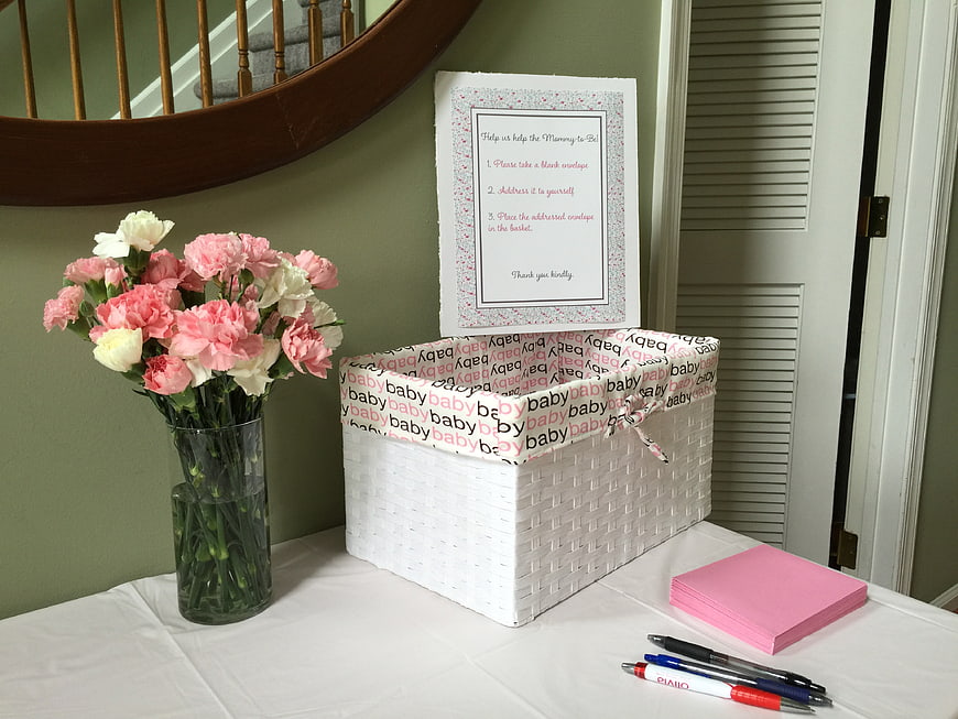 Baby Shower Advice Station with Pink Carnations and Pens