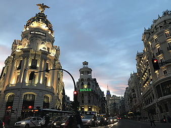 Metropolis Building and Gran Vía Street in Madrid at Dusk