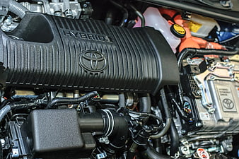 Close-up of Toyota Hybrid Engine Bay with Orange Cables