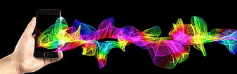 Hand holding smartphone with colorful abstract digital waves