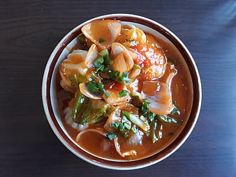 Top View of Spicy Chilli Momo Dumplings in Bowl