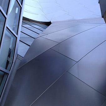 Modern Futuristic Architecture with Geometric Metal Panels