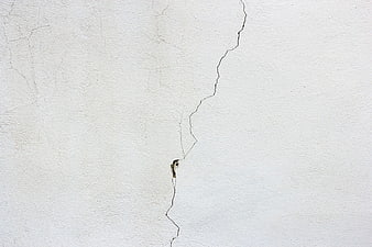Cracked White Plaster Wall Texture Background