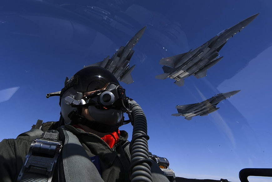 Fighter Pilot in Cockpit with F-15 Formation Flight