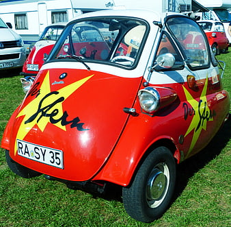 Vintage Red BMW Isetta Microcar With Star Decals At Outdoor Car Show