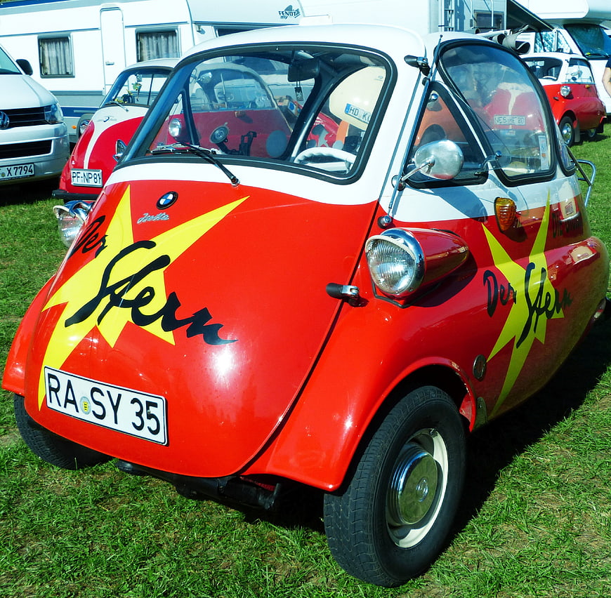 Vintage Red BMW Isetta Microcar With Star Decals At Outdoor Car Show