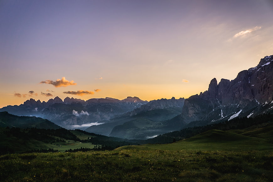 Dramatic Dolomites Sunset Landscape with Green Meadows