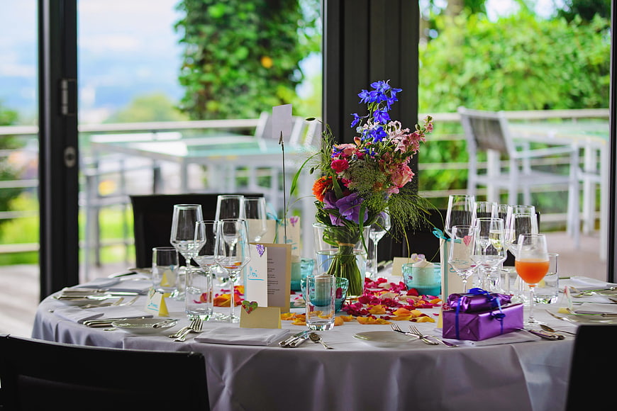 Elegant Wedding Table Setting with Flowers and Gifts