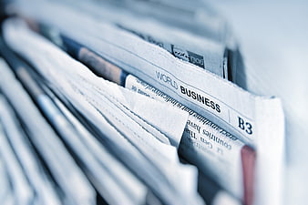 Close-up of World Business Newspaper Section