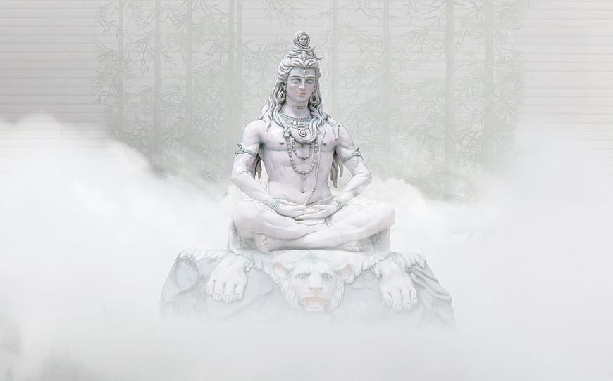 Meditating Shiva Statue in Misty Bamboo Forest
