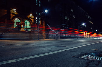 Long Exposure Night City Street with Red Light Trails