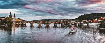 Charles Bridge and Vltava River in Prague at Dusk