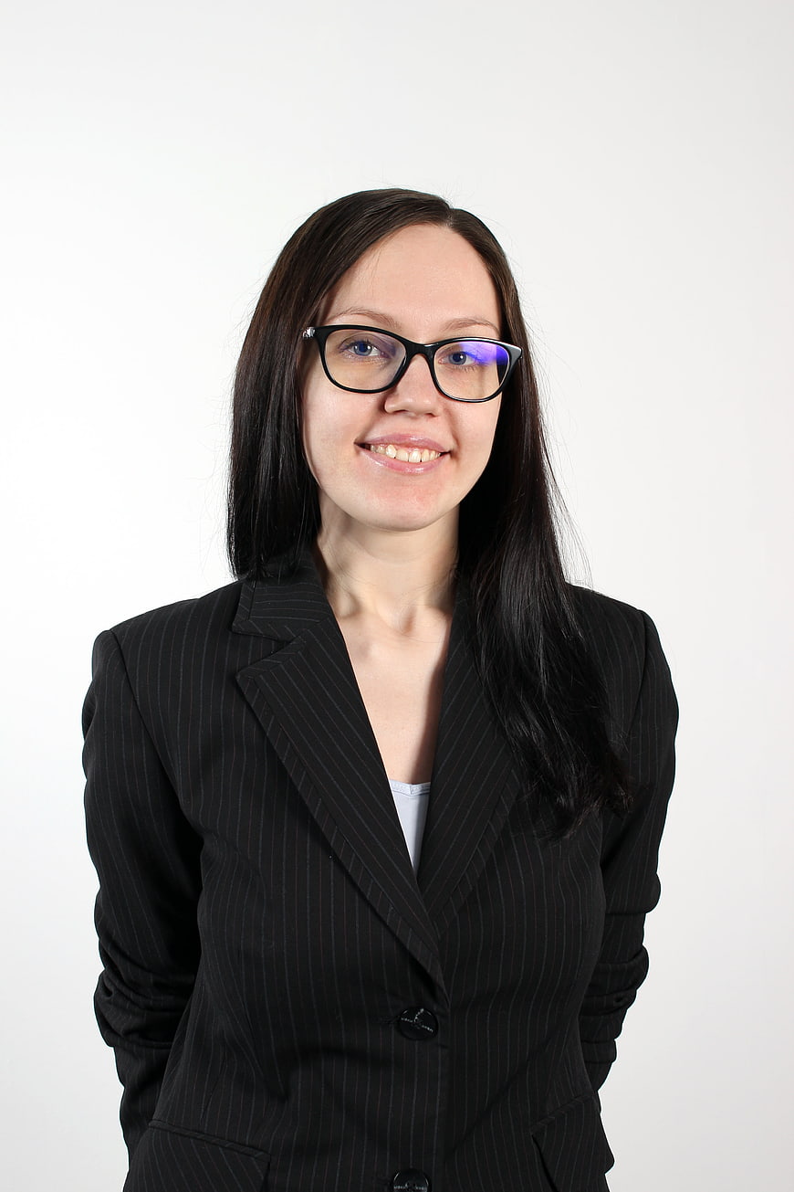 Professional Portrait of Business Woman in Black Pinstripe Suit