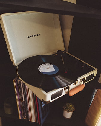 Vintage Crosley Record Player with Vinyl Records