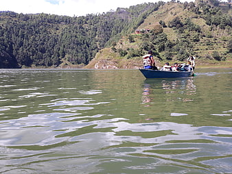 Group boating on Kulekhani Dam lake in Nepal