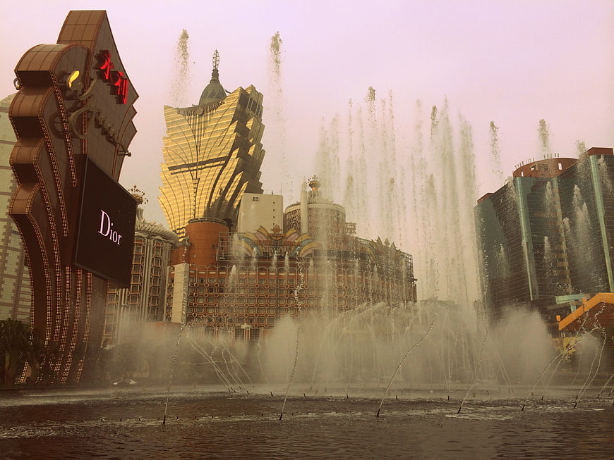 Macau Grand Lisboa Hotel and Dancing Fountains at Dusk